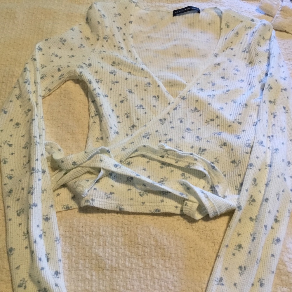 Long sleeved floral wrap top